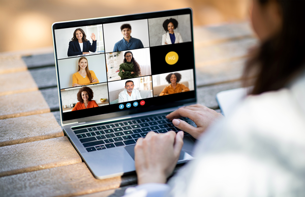 Person on laptop video call meeting