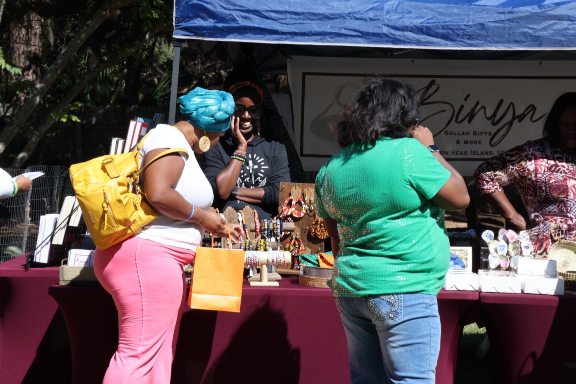 People shopping at the Binya tent at the 2024 Gullah Food Festival 