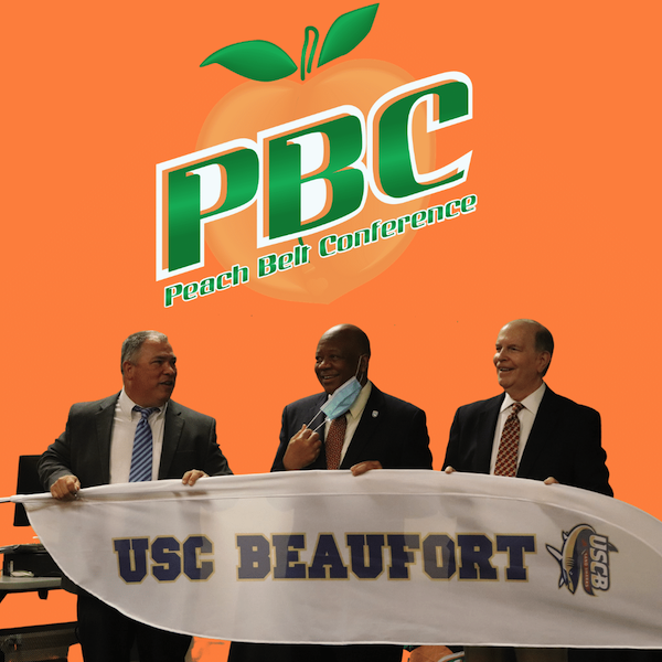 Peach Belt Conference Commissioner David Brunk (right) welcomed University of South Carolina Beaufort to the league on April 14 in a press conference at USCB. Supported by Chancellor Al Panu, USCB Athletic Director Quin Monahan (left) enthusiastically accepted the invitation, which is contingent upon USCB being accepted into the NCAA Division II provisional process.