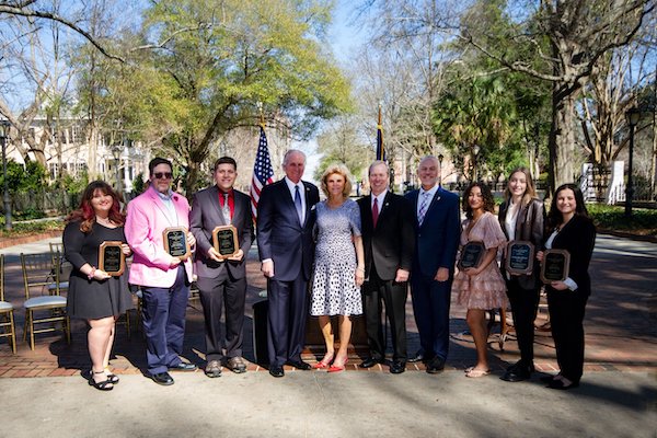 (From Left to Right) Bethany McDonald, Mark Stedhman, Lewis Lambert, Governor Henry McMaster, First Lady Peggy McMaster, Duane Parrish, director of the South Carolina Department of Parks, Recreation & Tourism, Douglas OFlaherty, chair of South Carolina Travel and Tourism Coalition and vice president of the South Carolina Restaurant and Lodging Association, Hailey Keith, Maria Williams Caymen, Meghan Keeler 