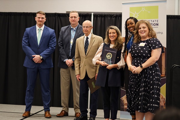 From Left to Right: Jeff Robinson (PSAE Incoming Board Chair), Bradley Wingate (PSAE Board Chair), Ray Doughty, Libby Ricardo, Alethea Bryant-Dixon (PSAE Board Member), and Jenny Kabool (PSAE Executive Director)